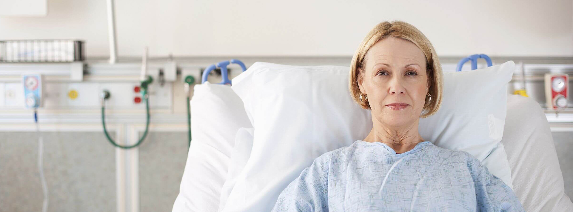 lady laying in bed in hospital